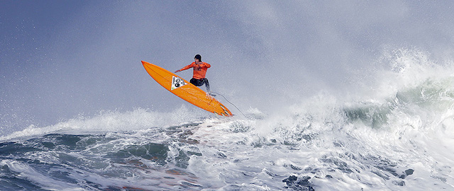 Tyler Fox flies out of a wave during the second heat of the first round of the Mavericks Invitational big wave surf contest Friday, Jan. 24, 2014, in Half Moon Bay, Calif. (AP Photo/Eric Risberg)