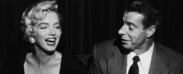 Joe makes a hit - Joe di Maggio draws a big smile from his movie-star wife Marilyn Monroe at the El Morocco restaurant in New York City late Sept. I2, 1954. Happy couple was dining with friends after Joe flew in from the west coast to join the "Mrs. Marilyn is in town" to make street scenes in Manhattan for her new picture, "the seven year itch". (AP Photo)
