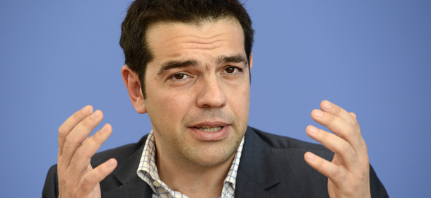 Alexis Tsipras, leader of the Greek radical leftwing Syriza party speaks during a joint press conference with leaders of the Linke (German Left Party) after a meeting in Berlin on May 22, 2012. AFP PHOTO / ODD ANDERSEN (Photo credit should read ODD ANDERSEN/AFP/GettyImages)