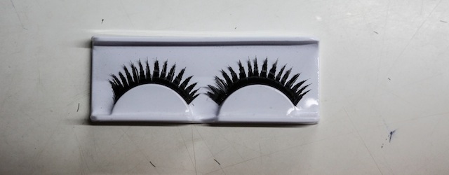 PURBALINGGA, CENTRAL JAVA - JANUARY 13: A sample of a set of completed false eyelashes on January 13, 2014 in Purbalingga, Central Java, Indonesia. The Victoria & Albert Museum in London, UK has caused a stir with its decision to exhibit a pair of false eyelashes from the Katie Perry range, made here at the Eylure workshop. With the women's wages as low as $39 USD per month or $0.19 USD per hour despite the vast mark up and booming sales in the western world, the industry has come under scrutiny for its low pay and unethical work. (Photo by Putu Sayoga/Getty Images)