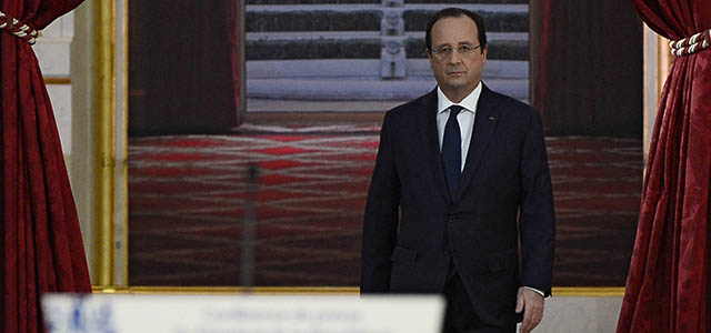 French president Francois Hollande arrives to give a press conference to present his 2014 policy plans, on January 14, 2014 at the Elysee presidential palace in Paris. This high-profile press conference was initially expected to culminate with a key announcement on reforms to spur economic growth and create jobs but it is yet mostly seen as his first public appearance since news of his alleged affair with a French actress became public. AFP PHOTO ALAIN JOCARD (Photo credit should read ALAIN JOCARD/AFP/Getty Images)