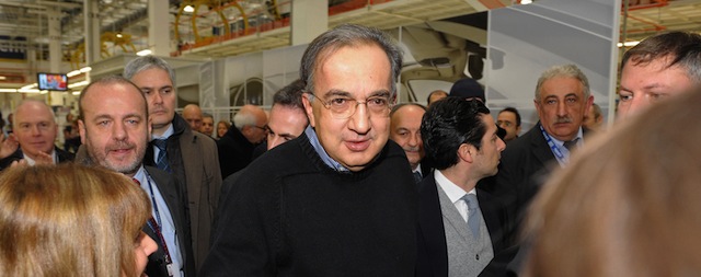 Fiat chief executive Sergio Marchionne greets workers during the opening of a new plant for the company's luxury brand Maserati on January 30, 2013 in Grugliasco. Italian auto giant Fiat's bosses said they had made "difficult choices" to continue producing in Italy despite a fall in sales but would not be shutting any plants as feared earlier. AFP PHOTO / FILIPPO ALFERO (Photo credit should read Filippo Alfero,Filippo Alfero/AFP/Getty Images)