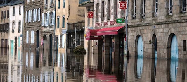 A picture shows the centre of Quimperle, western of France, on January 3, 2014, flooded by the Laita river. Britanny has been placed under flood warning due to heavy rain and high tidal coefficient. AFP PHOTO/FRED TANNEAU (Photo credit should read FRED TANNEAU/AFP/Getty Images)