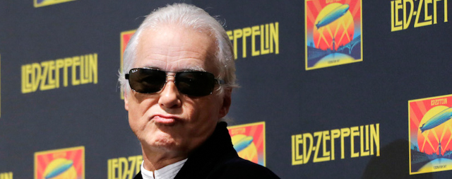 Led Zeppelin guitarist Jimmy Page poses for photo during a press conference of his film "Celebration Day" in Tokyo, Tuesday, Oct. 16, 2012. (AP Photo/Koji Sasahara)
