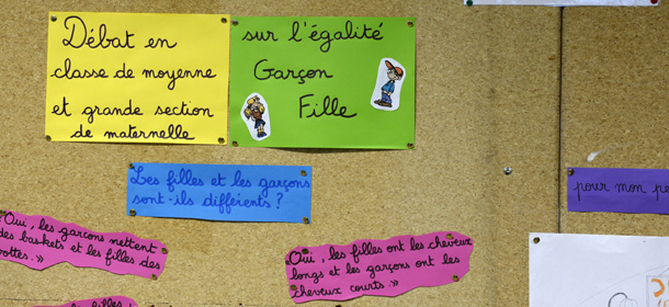 Notes and phrases on the equality between boys and girls are posted on a bulletin board in a primary school during a visit of the French Education Minister and French Minister for Women's Rights and Government Spokesperson on the theme "The ABCD of equality" on January 13, 2014, in Villeurbanne near Lyon, central-eastern France. AFP PHOTO/PHILIPPE DESMAZES (Photo credit should read PHILIPPE DESMAZES/AFP/Getty Images)