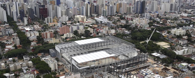 FILE - This Dec. 14 2013 file photo shows an aerial view of the Arena da Baixada stadium in Curitiba, Brazil. Brazilian authorities are pushing for this stadium to be finished in time for the 2014 World Cup soccer tournament. (AP Photo/Renata Brito, File)