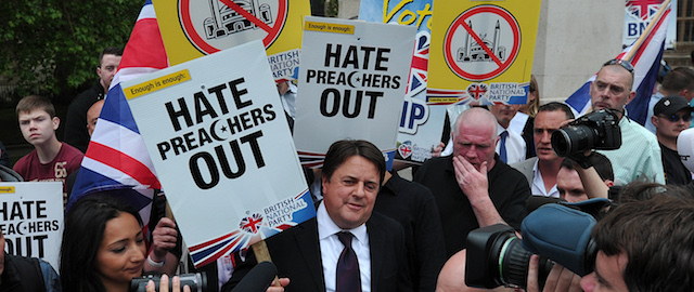 British National Party (BNP) leader Nick Griffin (C) speaks to the media during a demonstration in central London on June 1, 2013. AFP PHOTO / CARL COURT (Photo credit should read CARL COURT/AFP/Getty Images)