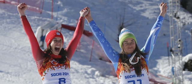 SOCHI, RUSSIA - FEBRUARY 12: (FRANCE OUT) Dominique Gisin of Switzerland and Tina Maze of Slovenia win joint gold medals during the Alpine Skiing Women's Downhill at the Sochi 2014 Winter Olympic Games at Rosa Khutor Alpine Centre on February 12, 2014 in Sochi, Russia. (Photo by Alain Grosclaude/Agence Zoom/Getty Images)