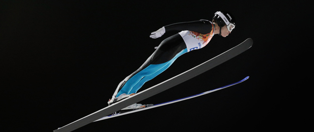 SOCHI, RUSSIA - FEBRUARY 11: Lindsey Van of the United States soars through the air during the Ladies' Normal Hill Individual trial on day 4 of the Sochi 2014 Winter Olympics at the RusSki Gorki Ski Jumping Center on February 11, 2014 in Sochi, Russia. (Photo by Adam Pretty/Getty Images)