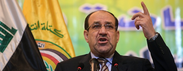 Iraqi Prime Minister Nuri al-Maliki speaks during a political meeting attended by members of the army and political leaders to talk about the ongoing fighting between the Iraqi army and al-Qaeda-linked groups in the Anbar province, on January 11, 2014, in Baghdad. Maliki is facing one of the biggest challenges of his eight-year rule as gunmen held crucial territory on Baghdad's doorstep today despite tribesmen and police retaking militant-held areas west of the capital, as the UN Security Council backed Iraq's efforts against Al-Qaeda-linked extremists. AFP PHOTO/SABAH ARAR (Photo credit should read SABAH ARAR/AFP/Getty Images)