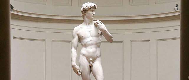 ** FILE ** Michelangelo's marble statue of "David", is seen in Florence's Galleria dell' Accademia in this Monday, May 24, 2004 file photo. The heroic David could be on the move after 135 years in the museum designed to showcase the marble masterpiece. The impact of mass tourism on Florence's city center is forcing officials to consider remedies, including one drastic proposal to move the 4.34 meter (14 foot) statue from the Galleria dell'Accademia to the edge of the city where a new theater is planned. Florence Mayor Leonardo Dominici told, during a press conference at Foreign press Association, Thursday Jan. 17, 2008, that congestion is a problem, along with the deposits of chewing gum stuck to the building by idle tourists waiting to view the 500-year-old nude sculpture. (AP Photo/Fabrizio Giovannozzi, File)