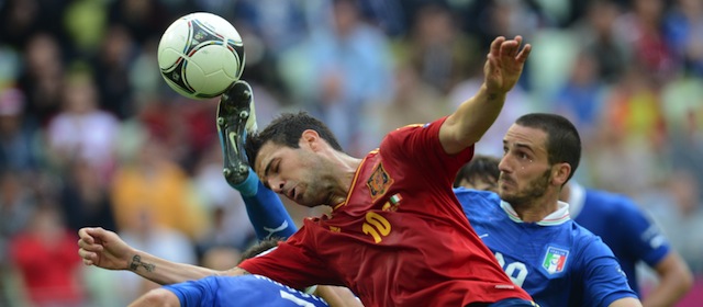 Spanish midfielder Cesc Fabregas (C) heads the ball during the Euro 2012 championships football match Spain vs Italy on June 10, 2012 at the Gdansk Arena. AFP PHOTO / CHRISTOF STACHE (Photo credit should read CHRISTOF STACHE/AFP/GettyImages)