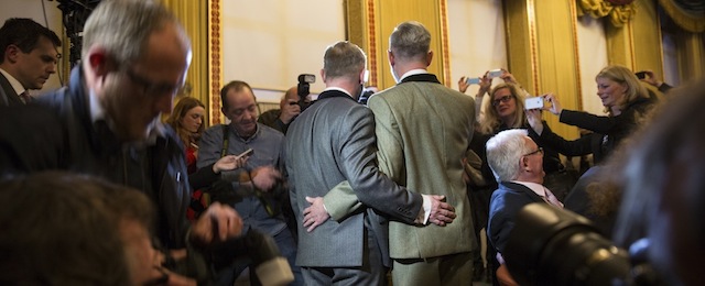 BRIGHTON, UNITED KINGDOM - MARCH 29: Gay couple Neil Allard and Andrew Wale speak to the media after their wedding in the Music Room of Brighton's Royal Pavilion shortly after midnight in one of the UK's first same-sex weddings on March 29, 2014 in Brighton, England. Same sex couples have been able to enter into 'civil partnerships' since 2005, however following a change in the law in July 2013 gay couples are now eligible to marry in England and Wales. A number of gay couples have arranged for their wedding ceremonies to take place shortly after midnight on March 29, 2014 to become some of the first to take advantage of the new law. Parliament's decision to grant same sex couples an equal right to marriage has been met with opposition from religious groups. Gay marriage is currently being debated in Scotland, however the Northern Ireland administration has no plans to make it law. (Photo by Oli Scarff/Getty Images)