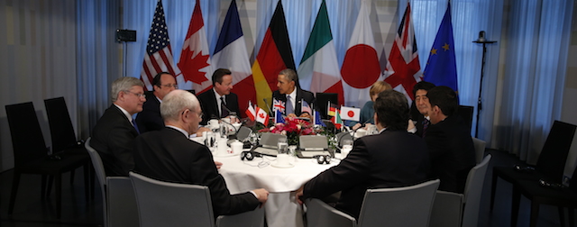 THE HAGUE, NETHERLANDS - MARCH 24: (L-R) President of the European Council Herman van Rompuy, Canadian Prime Minister Stephen Harper, French President Francois Hollande, British Prime Minster David Cameron, U.S. President Barack Obama, German Chancellor Angela Merkel, Japanese Prime Minister Shinzo Abe, Italian Prime Minister Matteo Renzi and President of the European Commission Jose Manuel Barroso attend a meeting of the G7 leaders on March 24, 2014 in The Hague, Netherlands. The G7 countries are meeting to discuss the recent developments in Ukraine, and to consider their response and any sanctions to be imposed upon Russia in answer to its annexing of the Crimea region. (Photo by Jerry Lampen - Pool/Getty Images)