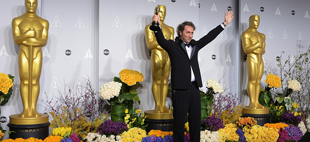 Director Paolo Sorrentino celebrates winning Best Foreign Language Film for 'The Great Beauty' (Italian) in the press room during the 86th Academy Awards on March 2nd, 2014 in Hollywood, California. AFP PHOTO / Joe KLAMAR (Photo credit should read JOE KLAMAR/AFP/Getty Images)