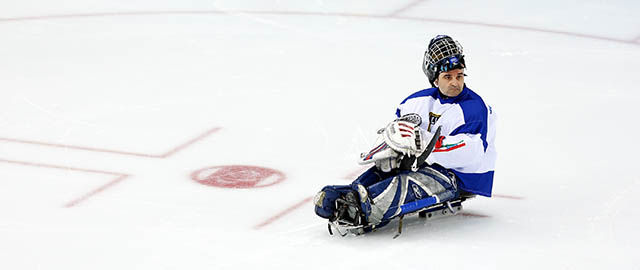 SOCHI, RUSSIA - MARCH 09: Italian goalkeeper Santino Stillitano looks dejected after conceding the fourth goal during the Ice Sledge Hockey Preliminary Round Group B match between Russia and Italy at Shayba Arena on March 9, 2014 in Sochi, Russia. (Photo by Harry Engels/Getty Images)