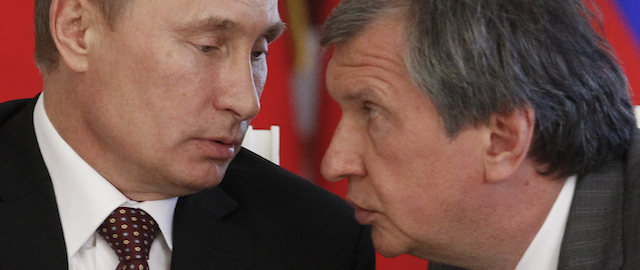 Russia's President Vladimir Putin (L) talks to Rosneft President and Chairman of the Management Board Igor Sechin during a signing ceremony with his Venezuelan counterpart Nicolas Maduro at the Kremlin in Moscow, on July 2, 2013. AFP PHOTO / POOL/ MAXIM SHEMETOV (Photo credit should read MAXIM SHEMETOV/AFP/Getty Images)