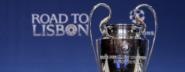 The champions league trophy stands on the podium during the draw for the last 16 of the UEFA Champions league tournament at the UEFA headquarters in Nyon on December 16, 2013. AFP PHOTO / FABRICE COFFRINI (Photo credit should read FABRICE COFFRINI/AFP/Getty Images)