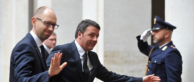 Italian Prime Minister Matteo Renzi (C) welcomes Ukraines Prime Minister Arseniy Yatsenyuk upon their meeting on April 26, 2014 at the Palazzo Chigi in Rome. AFP PHOTO / TIZIANA FABI (Photo credit should read TIZIANA FABI/AFP/Getty Images)
