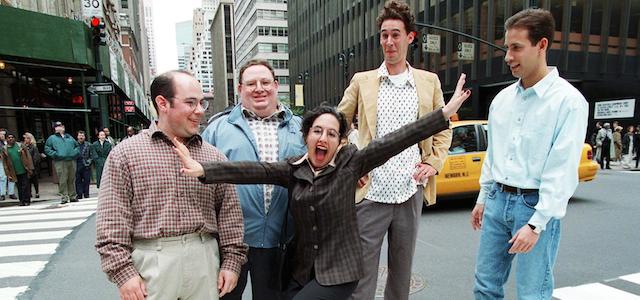 NEW YORK, UNITED STATES: Television series "Seinfeld" look-a-like contest winners (L-R) Michael Curiso (George), Robert Levitt, (Newman); Dawn Nechamkin,(Elaine); Frank Barry, (Kramer) and Dan Beetar, (Jerry) pose in the middle of Madison Avenue 12 May after the finals selection was made. The contest was held by Sprint PCS and a New York radio station. The last episode of "Seinfeld" will air 14 May. AFP PHOTO Timothy A. Clary (Photo credit should read TIMOTHY A. CLARY/AFP/Getty Images)