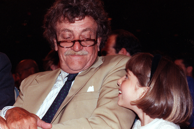 **FILE** Governor's Arts Award winning author Kurt Vonnegut glances down at his daughter Lilly,7, in this file photo from June 29, 1990, during the New York State Governor's Arts Awards ceremony at the Metropolitan Museum of Art. Kurt Vonnegut's wife, Jill Krementz says the satirical novelist of works such as "Slaughterhouse-Five" and "Cat's Cradle" has died Wednesday Aprill 11, 2007 at age 84 in Manhattan.(AP Photo/David Kantor-File)