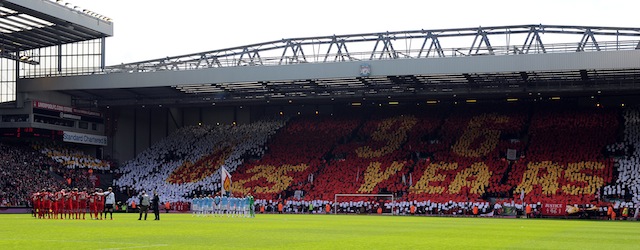 A minutes silence is observed prior to kick off to mark the 25th anniversary of the Hillsborough disaster during the English Premier League soccer match between Liverpool and Manchester City at Anfield in Liverpool, England, Sunday, April. 13, 2014. (AP Photo/Clint Hughes)