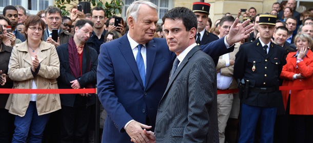 PARIS, FRANCE - APRIL 01: Prime minister Jean-Marc Ayrault (L) and France's newly appointed Prime minister Manuel Valls (R) attend the take over ceremony, while power is transferred to Manuel Valls after the resignation of French Prime minister Jean-Marc Ayrault at Hotel Matignon on April 1, 2014 in Paris, France. (Photo by Pascal Le Segretain/Getty Images)