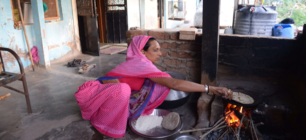 An Indian transgender prepares Chapattis at home in Becharaji, some 110 kms from Ahmedabad on April 15, 2014. India's highest court ruled Tuesday that a person can be legally recognised as gender-neutral, a landmark judgement that raises hopes of an end to discrimination against several million transgenders and eunuchs. AFP PHOTO / Sam PANTHAKY (Photo credit should read SAM PANTHAKY/AFP/Getty Images)