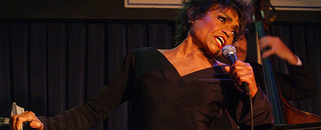 Singer and actress Eartha Kitt performs at the Blue Note jazz club Thursday, July 22, 2004, in New York. (AP Photo/Frank Franklin II)