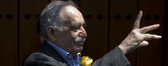 In this March 6, 2014 photo, Colombian Nobel Literature laureate Gabriel Garcia Marquez greets fans and reporters outside his home on his 87th birthday in Mexico City. Garcia Marquez died Thursday April 17, 2014, at his home in Mexico City. The author's magical realist novels and short stories exposed tens of millions of readers to Latin America's passion, superstition, violence and inequality. (AP Photo/Eduardo Verdugo)