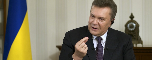 Ousted Ukrainian President Viktor Yanukovych gestures during an interview with The Associated Press, in Rostov-on-Don, Russia, Wednesday, April 2, 2014. Yanukovych says the annexation of Crimea was a tragedy and he would have done everything possible to prevent it, had he remained in power. (AP Photo/Ivan Sekretarev)
