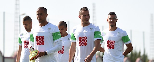 Algeria's national football team's players (LtoR) Islam Slimani, Madjid Bougherra, Hassan Yebda, Sofiane Feghouli and Nabil Bentaleb take part in a training session on May 26, 2014 at Sidi Moussa training center, outside the capital Algiers. AFP PHOTO / FAROUK BATICHE (Photo credit should read FAROUK BATICHE/AFP/Getty Images)