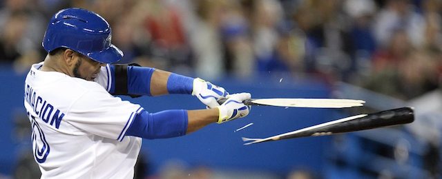 Toronto Blue Jays' Edwin Encarnacion hits a broken bat pop-out against the Los Angeles Angels during third inning American League baseball action in Toronto on Monday, May 12, 2014. T (AP Photo/The Canadian Press, Frank Gunn)