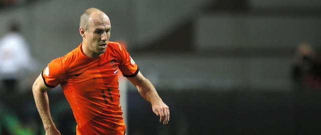 Netherlands' Arjen Robben plays the ball during the Group D World Cup qualifying soccer match between Netherlands and Hungary, at ArenA stadium in Amsterdam, Netherlands, Friday Oct. 11, 2013. (AP Photo/Peter Dejong)
