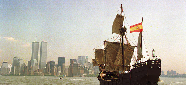 An authentic replica of Christopher Columbus' ship, the Santa Maria, sails through New York Harbor toward the World Trade Center's towers Friday, June 26, 1992. Replicas of all three of Columbus' ships were in New York for the July 4th ceremonies marking the 500th anniversary of the explorer's first journey to the Americas in 1492. (AP Photo/Alex Brandon)