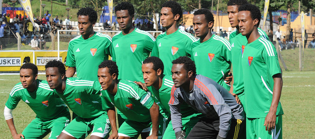 Eritrean national football team players pose on December 1, 2012 before a match against the Rwandan national team during the Council for East and Central Africa Football Associations (CECAFA) tournament at the Namboole International Stadium in Kampala. Ugandan officials said on December 3 that Eritrea's team had disappeared in Uganda in what would be potentially the fourth team to abscond from their authoritarian country. Ugandan police were alerted after 16 football team members disappeared after losing to Rwanda 2-0 in the CECAFA tournament. AFP PHOTO / STRINGER (Photo credit should read -/AFP/Getty Images)
