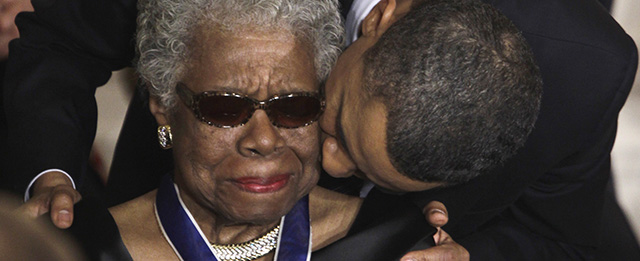 FILE - In this Feb. 15, 2011 file photo, President Barack Obama kisses author and poet Maya Angelou after awarding her the 2010 Medal of Freedom during a ceremony in the East Room of the White House in Washington. Angelou, author of "I Know Why the Caged Bird Sings," has died, Wake Forest University said Wednesday, May 28, 2014. She was 86. (AP Photo/Charles Dharapak, File)