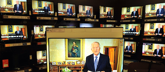 King Albert II of Belgium appears on TV screens displayed in a store in Brussels on July 3,2013, while delivering a speech from the royal palace in Brussels. Belgium's King Albert II today announced his abdication in favour of his son Philippe after two decades at the helm of the tiny country. "I intend to abdicate on July 21," the sovereign said in a speech broadcast to the nation from the royal palace. AFP PHOTO GEORGES GOBET (Photo credit should read GEORGES GOBET/AFP/Getty Images)