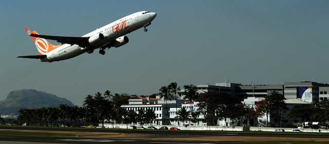 An airliner takes off from the Santos Dumont domestic airport on July 28, 2011 in Rio de Janeiro, Brazil. The airport will be closed during the FIFA's WC 2014 preliminary draw on July 30th to avoid the noise during the event. AFP PHOTO/NELSON ALMEIDA (Photo credit should read NELSON ALMEIDA/AFP/Getty Images)