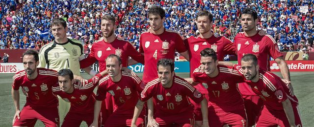 Spain's National Soccer team poses for a quick team photo before playing El Salvador's National team in a friendly match at FedEx Field June 7, 2014 in Landover, Maryland. Spain defeated El Salvador 2-0. AFP Photo/Paul J. Richards (Photo credit should read PAUL J. RICHARDS/AFP/Getty Images)