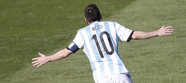 Argentina's forward and captain Lionel celebrates scoring during the Group F football match between Argentina and Iran at the Mineirao Stadium in Belo Horizonte during the 2014 FIFA World Cup in Brazil on June 21, 2014. AFP PHOTO / ADRIAN DENNIS