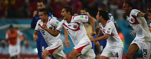 Costa Rica's players celebrate after winning a Round of 16 football match between Costa Rica and Greece at Pernambuco Arena in Recife during the 2014 FIFA World Cup on June 29, 2014. AFP PHOTO / PEDRO UGARTE