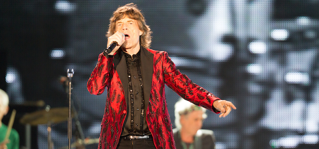 ABU DHABI, UNITED ARAB EMIRATES - FEBRUARY 21: Mick Jagger of The Rolling Stones performs at du Arena, Yas Island on February 21, 2014 in Abu Dhabi, United Arab Emirates. (Photo by Neville Hopwood/Getty Images)