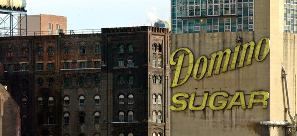 NEW YORK - JANUARY 30: The Domino Sugar sign at the plant's refinery plant is seen January 30, 2004 in New York CIty. Domino began operating in Brooklyn in 1856 when New York was the nation's largest sugar producer and after 148 years it is closing its refinery operation after Friday's shifts. (Photo by Stephen Chernin/Getty Images)