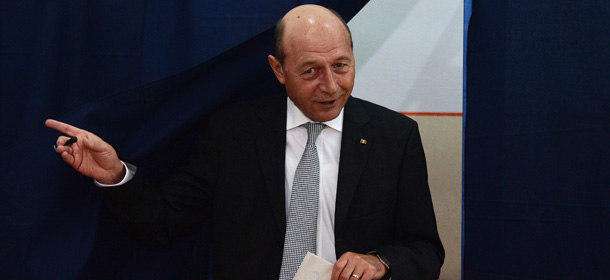 Romanian President Traian Basescu steps out of a polling booth after voting for the European Parliament elections on May 25, 2014 at a polling station in Bucharest. AFP PHOTO / DANIEL MIHAILESCU (Photo credit should read DANIEL MIHAILESCU/AFP/Getty Images)