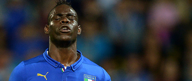 Italy's forward Mario Balotelli reacts during the friendly football match between Italy and Luxembourg on June 4, 2014, at the Renato Curi stadium in Perugia. AFP PHOTO / ALBERTO PIZZOLI (Photo credit should read ALBERTO PIZZOLI/AFP/Getty Images)