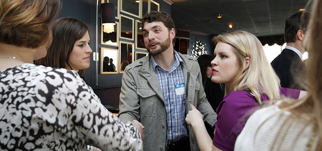 Ian Abston, founder of Newaukee, networks at Blu Bar at the top of the Pfister Hotel on April 11, 2013. Newaukee is a young professional networking group in Milwaukee that is looking to increase it's presence through Young Professional Week in various Milwaukee locations from April 14-21.