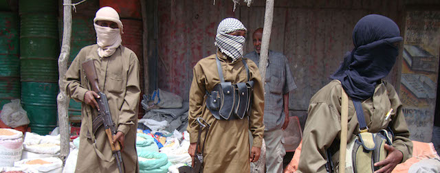 Armed Al-Shabaab fighters patrol Bakara Market, in Mogadishu, Somalia, Monday, June 29, 2009. Somali radical Islamic insurgent says weapons and ammunition the United States recently supplied to Somalia's embattled government will only increase violence in the war-wracked country. Sheik Hassan Ya'qub, a spokesman for the militant group al-Shabab in the port town of Kismayo, was responding to an announcement by U.S. officials last week that the Obama administration had supplied arms and provided military training worth just under $10 million to the shaky official government. (AP Photo/Farah Abdi Warsameh))