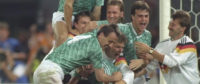 4 Jul 1990: West German players celebrate after their victory in the World Cup semi-final against England at the Delle Alpi Stadium in Turin Italy. West Germany won the match 4-3 on penalties. Mandatory Credit: David Cannon/Allsport