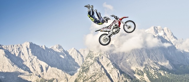 Brody Wilson of the United States of America performs in front of the Zugspitze, the highest mountain in Germany, prior to the upcoming fourth stage of the Red Bull X-Fighters World Tour in Munich, Germany on July 16, 2014.